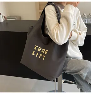 Große Kapazität Canvas Umhängetasche für Damen, stilvolle Buchstaben bestickte Tasche.