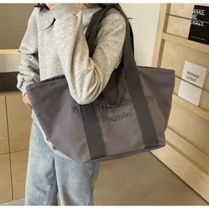 Große Canvas-Tragetasche für Damen, stilvolle lässige Umhängetasche mit Buchstabenstickerei.
