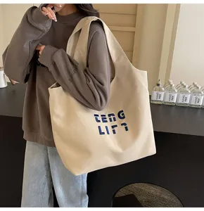 Große Kapazität Segeltuch Umhängetasche für Damen, stilvolle Buchstaben bestickte Tasche.
