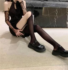 Collants transparents noirs sexy pour femmes, bas résille creux avec design jarretelle.