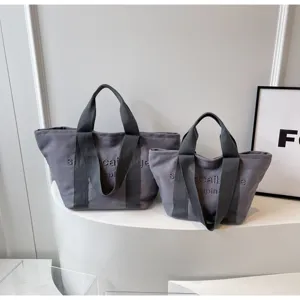 Grosse Kapazitaet Buchstaben bestickte Segeltuch Tasche modische Damen Schultertasche.