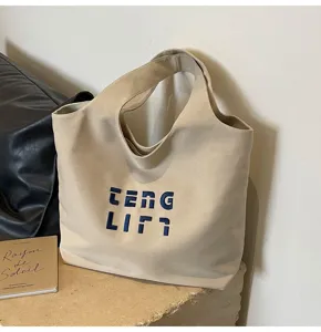 Große Canvas Tragetasche mit Stickerei, lässige minimalistische Schultertasche für Damen.