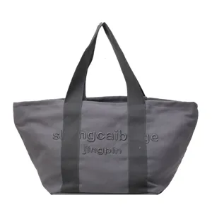 Grosse Segeltuch Tasche fuer Damen, elegante graue Schultertasche mit cooler Buchstaben Stickerei.