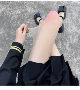 Detailed close-up of gradient fake skin pantyhose showing high elasticity and soft fabric texture.