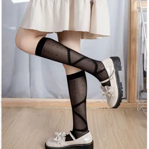 Sheer black JK knee high socks for women, breathable lace ruffle calf socks for sweet daily wear.