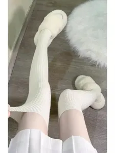 Cozy over-the-knee knitted socks with warm fuzzy slippers, perfect for winter daily wear.