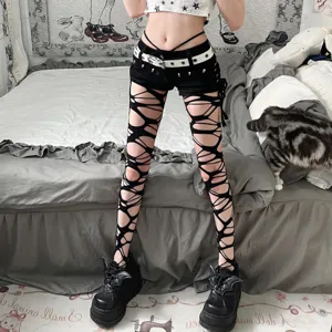 Gothic punk black distressed fishnet tights and cut-out hollow leggings for alternative style.