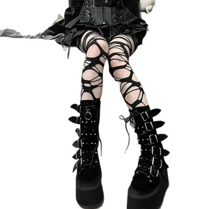 Gothic punk style ripped fishnet tights and platform buckle boots main product view.