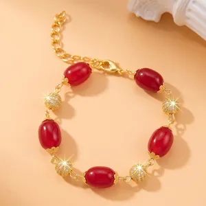 Bracciale bagnato in oro con perle rosse e sfere di cristallo gioielli eleganti donna