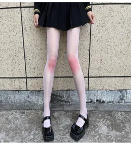 Detailed close-up shot of gradient blush white pantyhose, ultra-thin sheer JK style legwear.