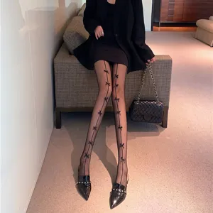 Black bow fishnet tights for women, gothic hollow out stockings with cute bows and slim fit.