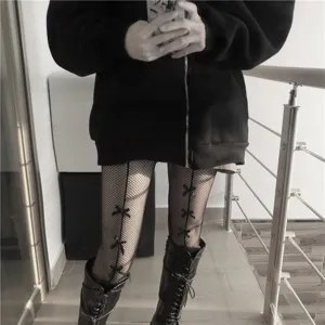 Black bow fishnet tights for women, edgy hollow out pantyhose, dark style JK clubbing hosiery.