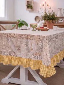 Pastoral crochet lace tablecloth with yellow checkered ruffle trim for dining room home table decor.