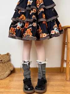 Japanese sweet lolita knit leg warmers with lace trim and bows, detailed view of gray socks.