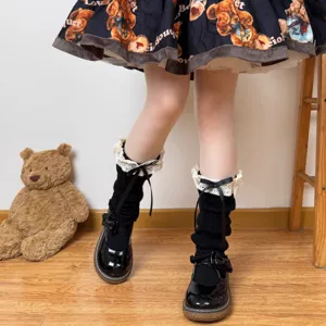 Japanese JK sweet lolita black knitted leg warmers with white lace ruffles and cute bows.