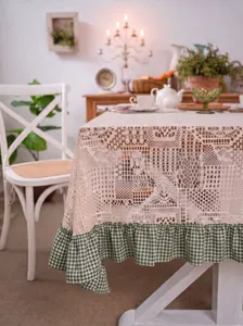 Vintage lace tablecloth with green checkered ruffle hem for elegant dining table decor