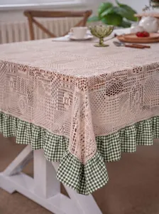 Pastoral crochet lace tablecloth with green checkered ruffle hem for dining table decor.