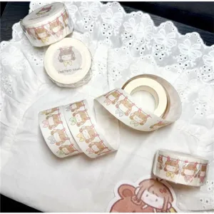 Cute girl themed washi tape detail showing intricate cartoon character designs and paper rolls.