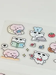 Cute cartoon sticker roll featuring sleepy bears and puppies, perfect for journaling and DIY crafts.