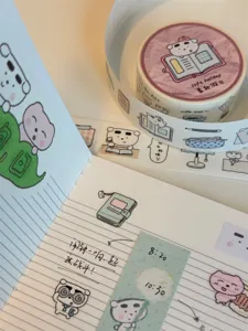 Cute cartoon puppy pet/washi decorative tape roll for bullet journal DIY planning and scrapbooking.