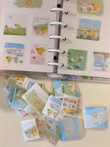 Washi-Sticker-Detail mit süßen Tierillustrationen und Alltagsszenen für Bullet Journals.