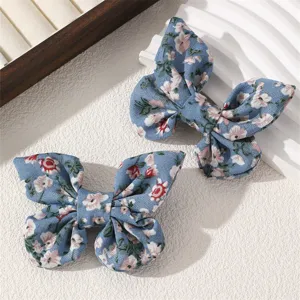 Cute floral fabric bow hair clips for girls, sweet blue double hairpins for daily wear styling.