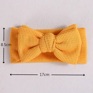 Bandeau noeud tricot gaufre bebe jaune accessoire cheveux enfant 17cm detail photo