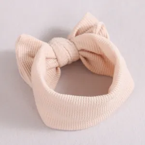 Joli bandeau bébé en tricot gaufré avec grand nœud, accessoire de cheveux confortable.