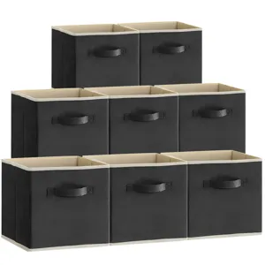 Detailed view of foldable fabric storage box set, stackable design for space saving organization.