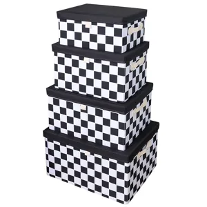 Boîte de rangement en tissu pliable avec design à carreaux noir et blanc pour la maison.