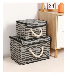 Foldable fabric storage boxes with lids and rope handles, gray dash pattern, home organization.