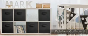 Foldable fabric storage bin for home wardrobe and nursery organization, black color.