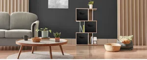 Fabric storage box detail view, showing foldable organizer bin in a modern living shelf.