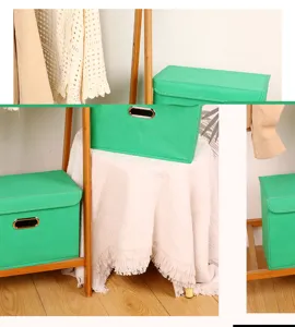 Grüne Stoff-Aufbewahrungsbox mit Deckel und Griff, faltbarer Kleiderschrank-Organizer.