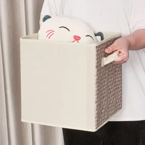 Scatola portaoggetti in tessuto pieghevole con maniglia, ideale per armadio e vestiti.