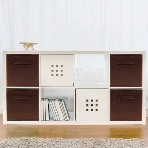 Detail scene showing brown fabric storage bins neatly organized inside a white cube shelf.