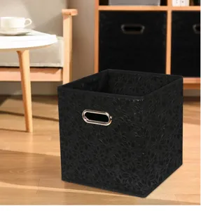 Black fabric foldable storage box with metal handle for home wardrobe clothes organization.
