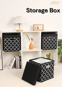 Foldable fabric storage box with classic black and white pattern for home organization.