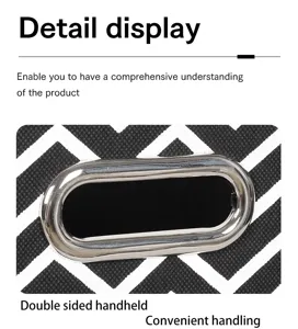 Foldable fabric storage box detail view with sturdy metal handle and stylish geometric pattern.