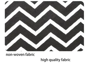 Detailed view of black and white chevron non-woven fabric material, showing texture and pattern.