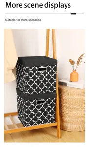 Collapsible fabric storage box with lid and handle, black and white geometric pattern for home.