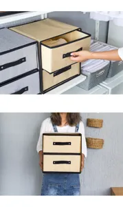 Fabric storage drawer detail showing convenient pull handle and neat closet organization setup.