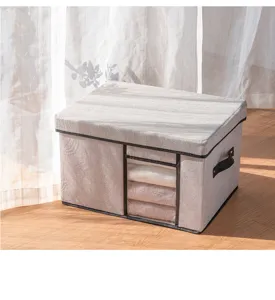 Linen fabric storage box detail view, collapsible clothing organizer with clear window.