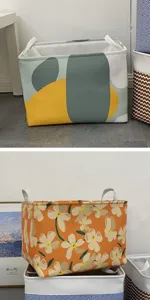 Détail de panier de rangement en tissu pliable avec imprimé abstrait et floral pour la maison.