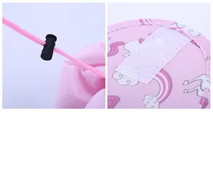 Close-up detail of pink cosmetic storage bag with cute unicorn pattern, drawstring and velcro.