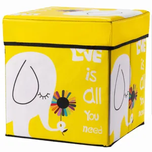 Yellow folding storage stool box with cute cartoon elephant print for home organization.