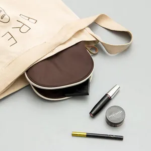 Portable small cosmetic bag, stylish shell makeup pouch for travel and daily use.