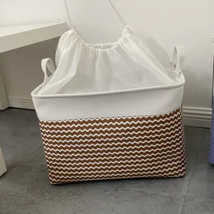 Durable foldable fabric storage basket with drawstring lid, brown chevron laundry hamper box.