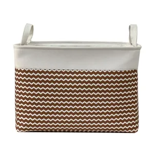 Brown and white chevron fabric storage basket with handles, ideal for clothes and toys organizing.