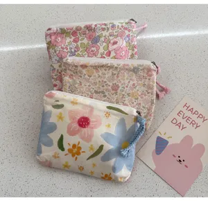 Cute floral pattern mini coin purse, fabric small zipper makeup pouch for daily use.